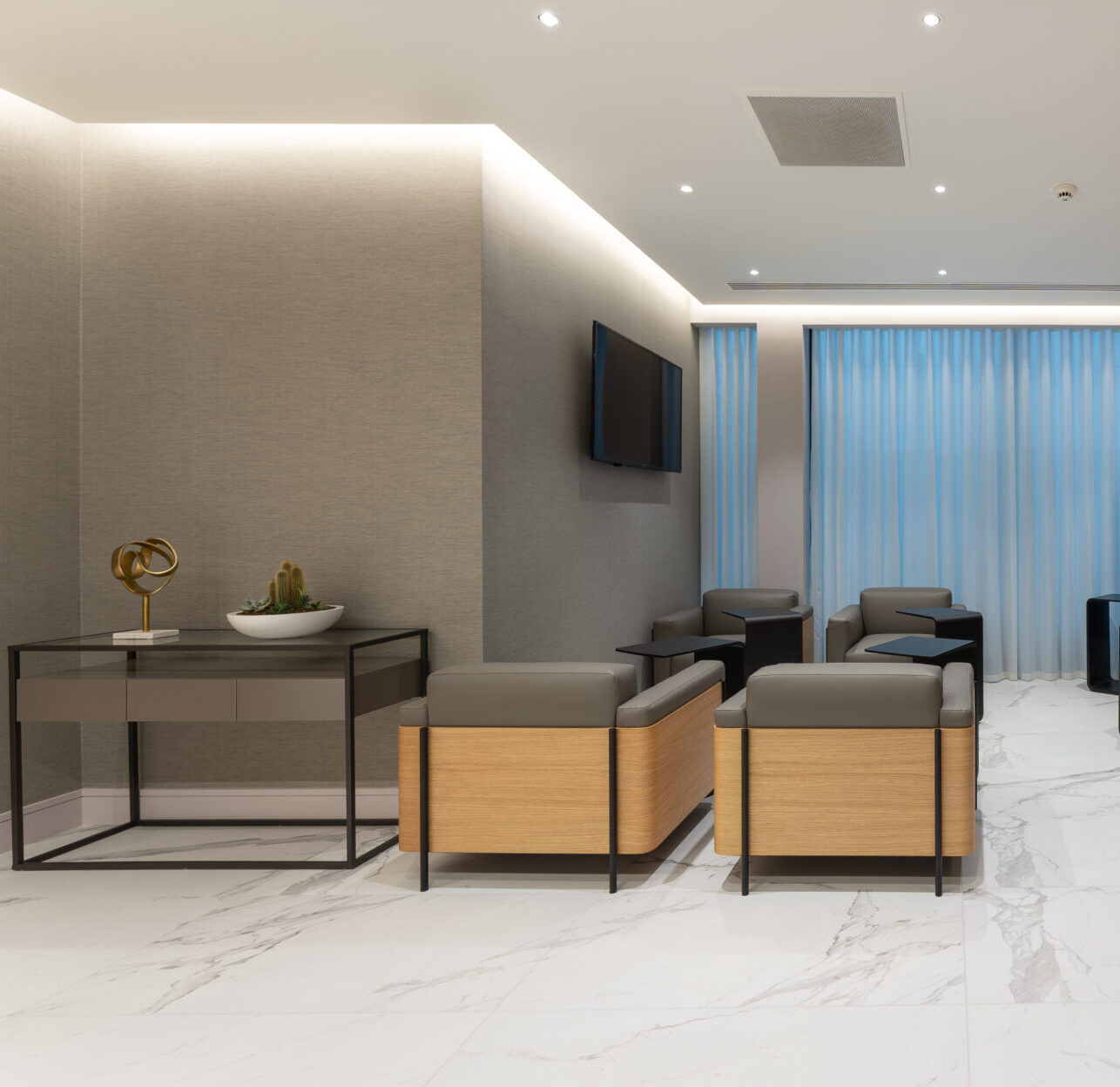 Beacon hospital enigma design reception desk panelling oak veneer batons brass tea station 06